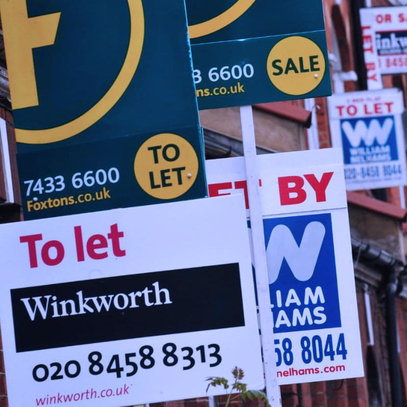 A collection of property 'for sale' signs