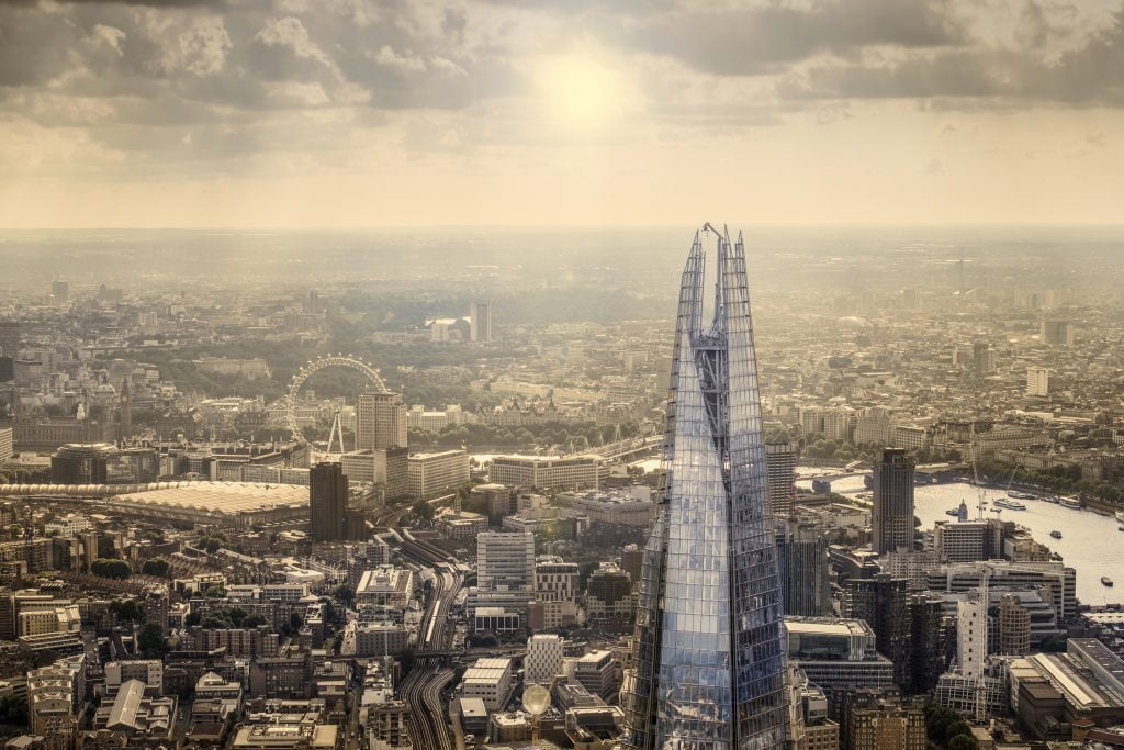 A view of central London, including the London Eye and the Shard in the foreground